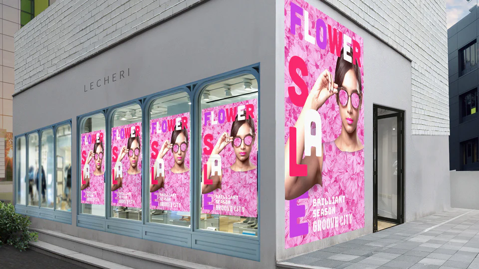 Kết quả hoàn thiện trong tutorial Adobe với nhiều poster được đặt đúng phối cảnh trên cửa kính và hai mặt tường của cửa hàng.